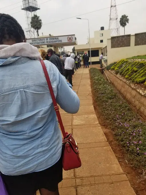 Duped Kenyans who fell victim to Urithi Housing Sacco's trap line up at the Directorate of Criminal Investigations (DCI) Headquarters along Kiambu Road, Nairobi on Wednesday, July 8 2020