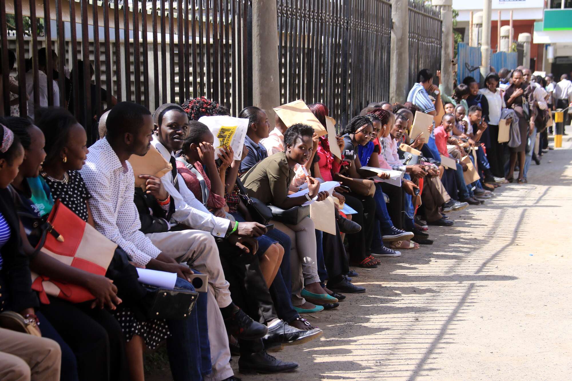 Jobseekers queue to hand in their applications