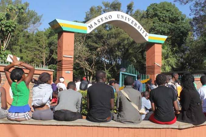Students outside the Maseno University main gate