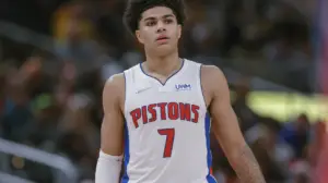 An image of Killian Hayes in a white Pistons shirt