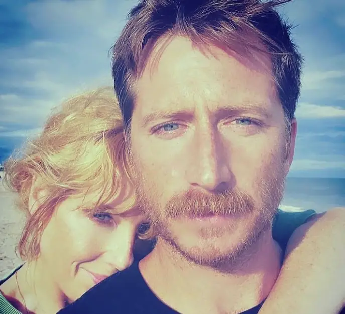 An image of Kyle Baugher and Kelly Reilly
