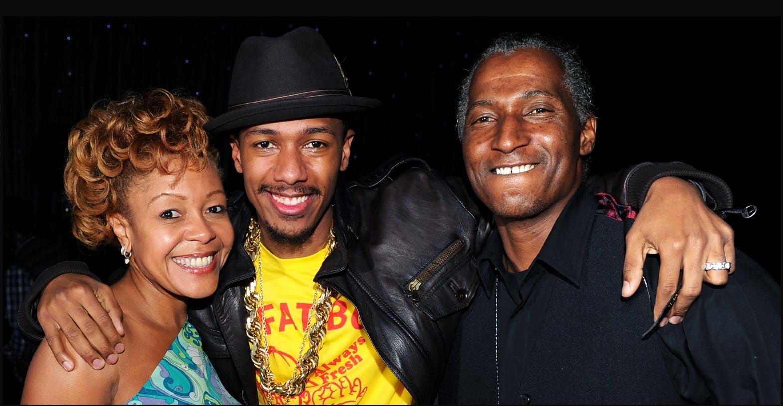 An image of Nick Cannon together with parents