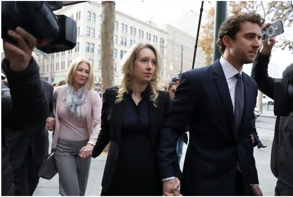 Elizabeth Holmes arrives with her family and partner, Billy Evans, to be sentenced on Friday. Photograph: Justin Sullivan/Getty Images