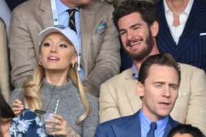 Ariana Grande was at the Wimbledon men’s singles final without her husband, Dalton Gomez, or her wedding ring.