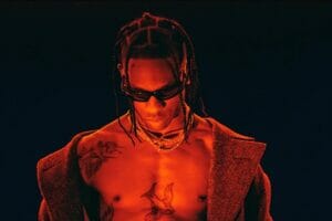 Travis Scott let a fan perform with him on stage after he jumped on past security at the Austin City Limits Music Festival. Watch the video and find out who the fan is and what he said.