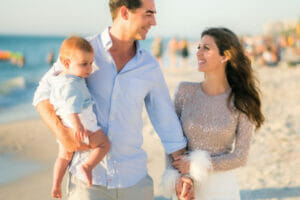 An Image of Jesse Watters with his wife and kid.