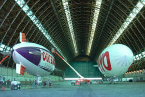 A captivating image of blimps floating in the sky.