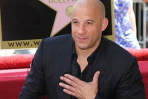 An image illustration of How tall is Vin Diesel