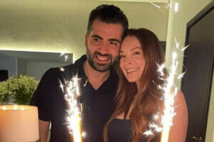 An image of Bader Shammas and Lindsay Lohan