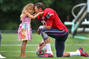 An image of Vivian Lake Brady and her father Tom Brady