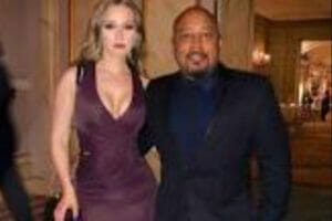 An image of Daymond John and his wife