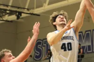 An image of Patrick Torrey playing basketball