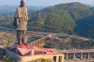 The Statue of Unity, the biggest statue in the world, standing tall against the sky in Gujarat, India.